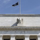 La Fed abaisse sans surprise ses taux d'un quart de point, entre 4% et 4,25%. Keystone/AP/J. SCOTT APPLEWHITE